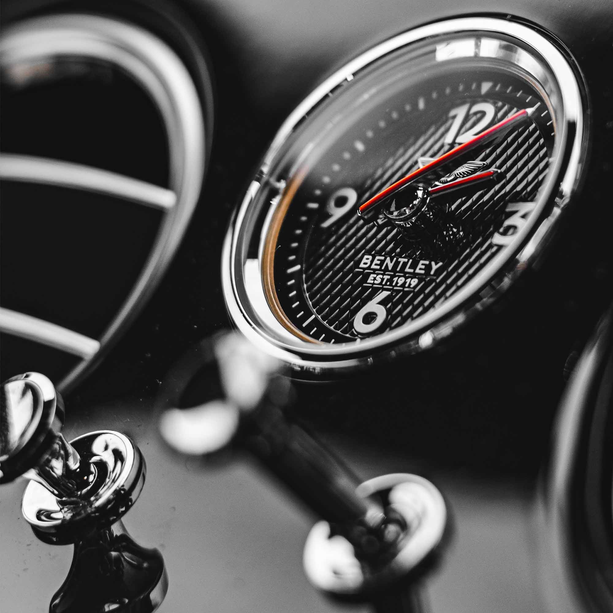 macro shot of a clock on a Bentley dashboard